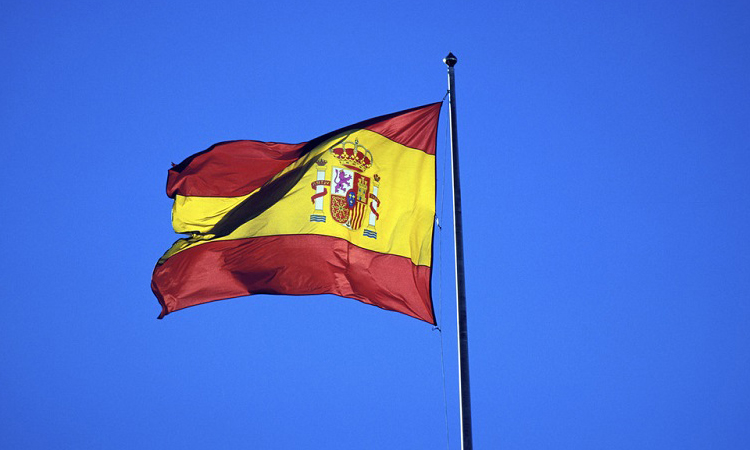 Spanish flag blows in the wind , Madrid , Spain , Europe