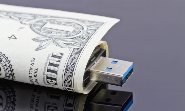 Portable USB flash drive is wrapped in a dollar